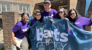 Barts Charity's people with banner